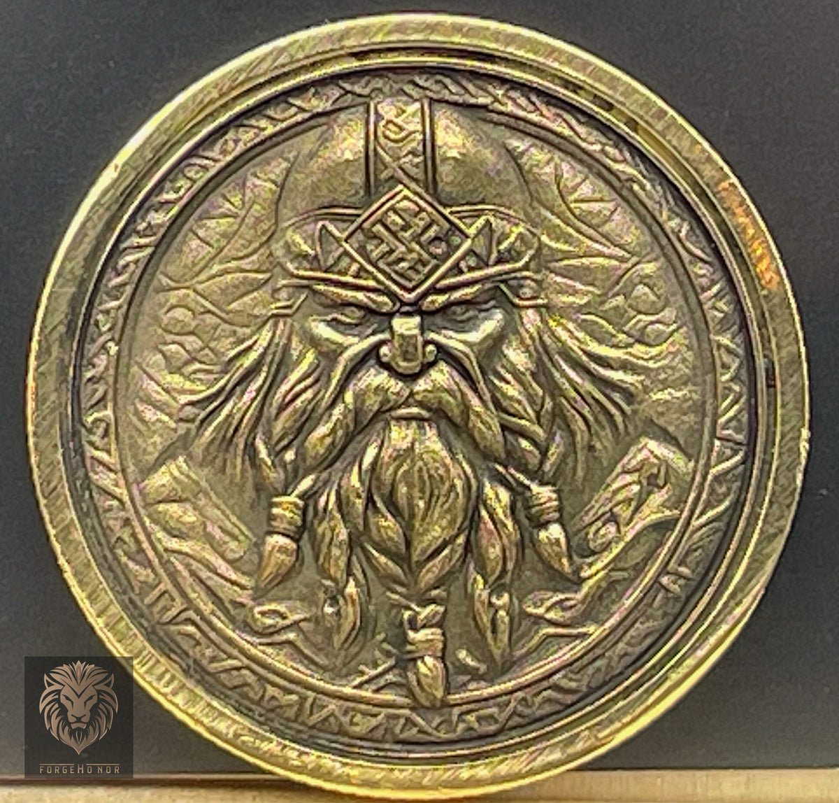 Detailed brass fantasy challenge coin photographed as an example of Forge Honor custom metalwork