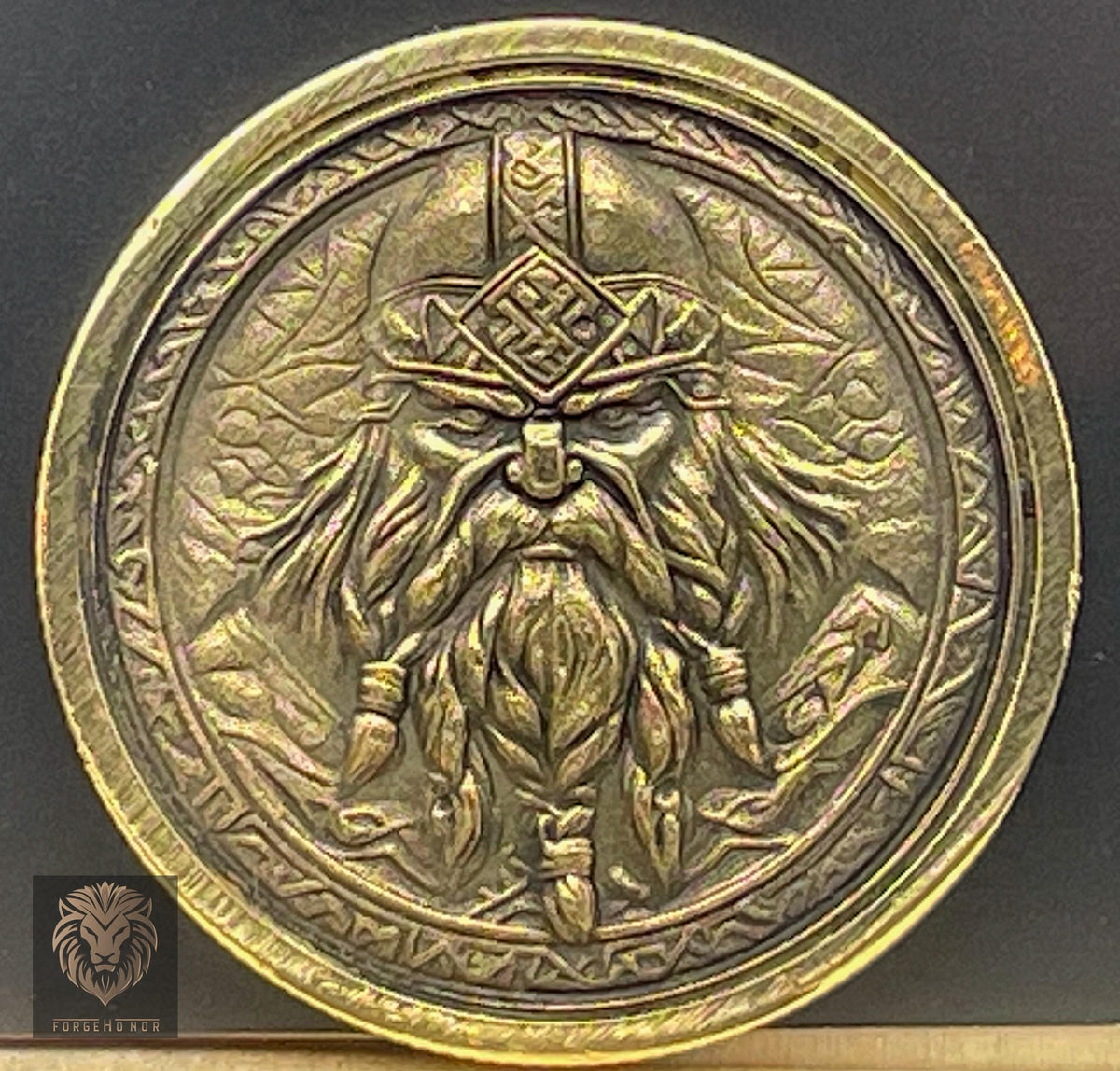 Forge Honor custom brass fantasy coin photographed on a dark tabletop
