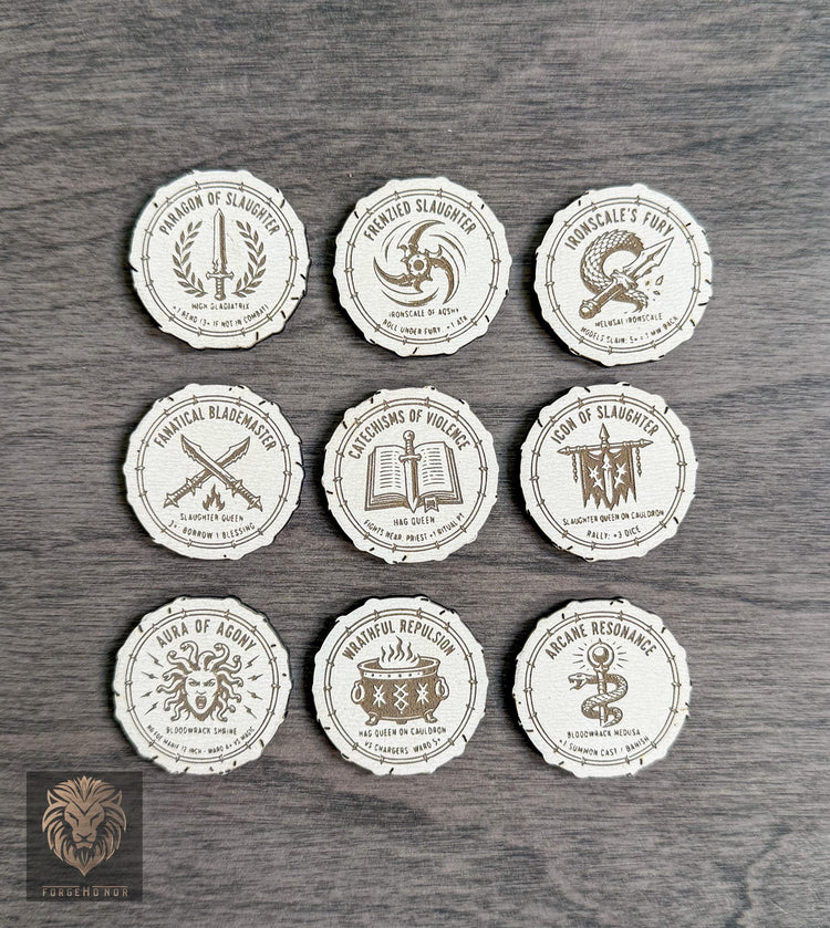Nine laser-engraved Daughters of Khaine ability tokens arranged on a wood tabletop