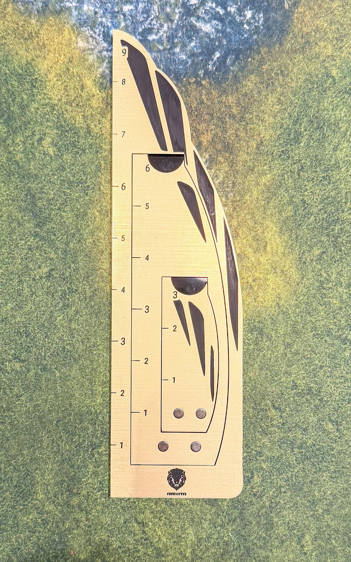 Forge Honor Wingmark 963 nesting movement gauge photographed on a gaming mat